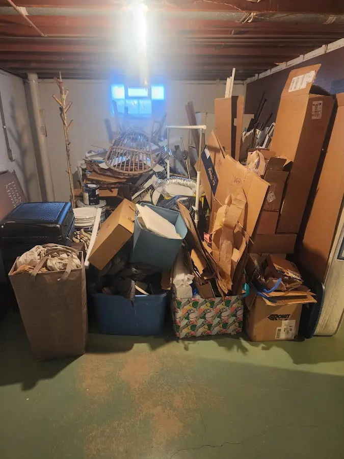 Roll-off dumpster container at job site for 6 Yard Dumpster Rental in Grinnell